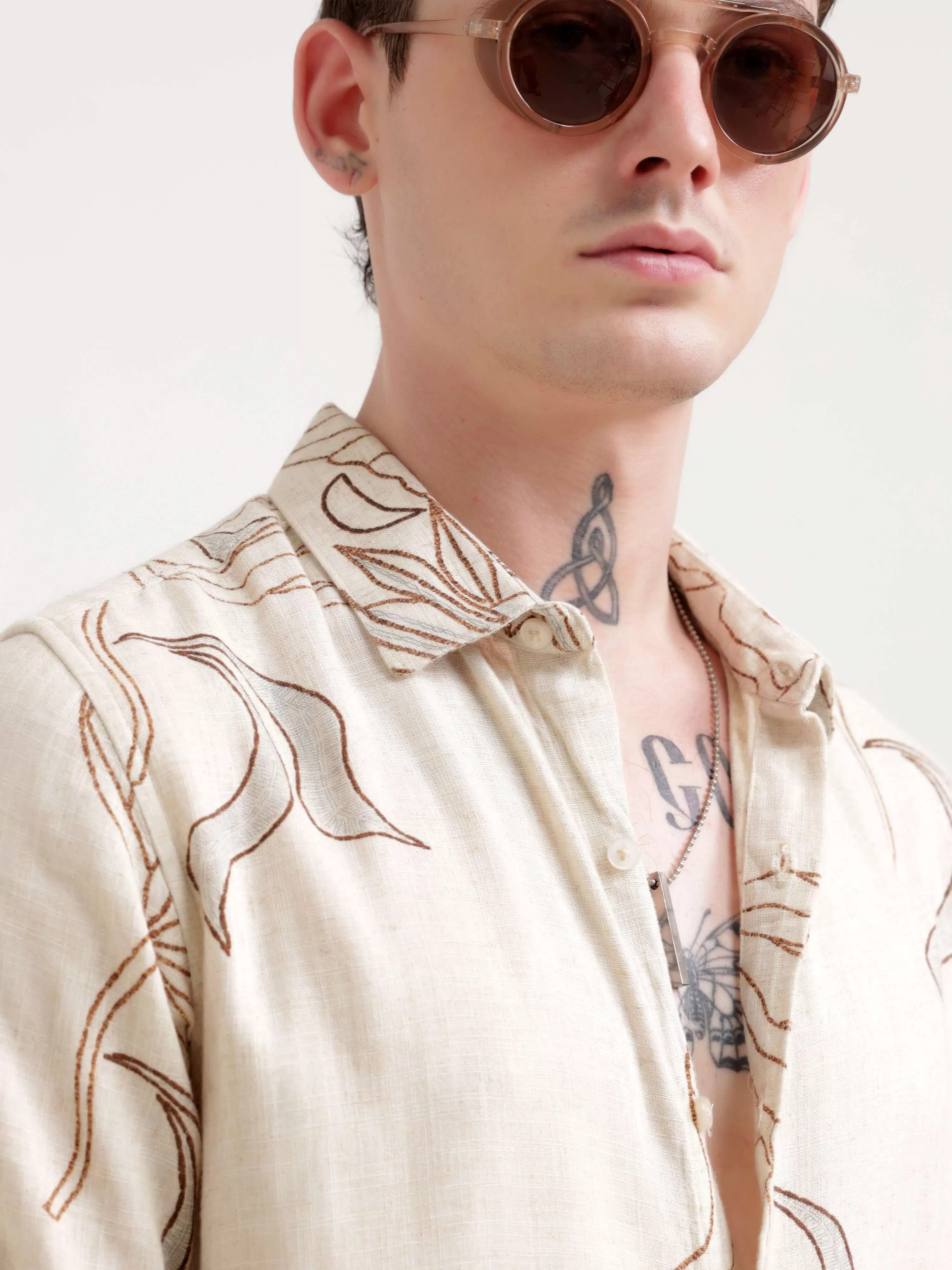 Floral printed beige half sleeve shirt